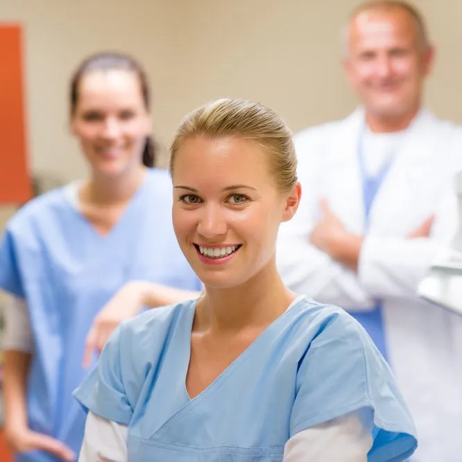 Smiling medical professional team at the surgery